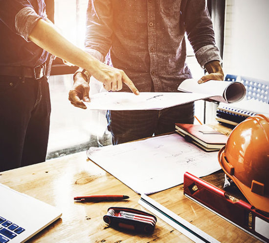 Construction workers in meeting