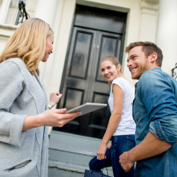 Young couple moving into new house